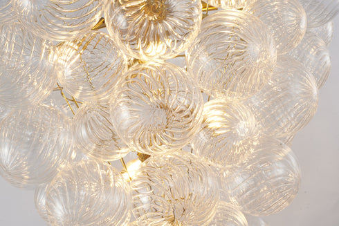 Bethel International 8 Light in Brass Meta Chandelier With Clear Swirl Glass Shades Model: KM13C32BR
