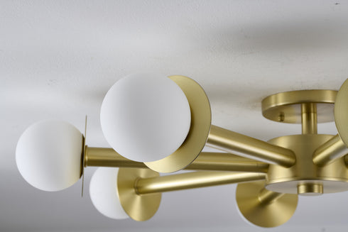 Bethel International 8 Light in Satin Brass Flush Mount With White Glass Globe Shades Model: BLT106C36BR