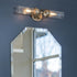 Hubbardton Forge Bow 2 Light Bath Sconce in Black Finish Model: 201346-SKT-10-ZM0634