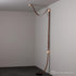 Hubbardton Forge SNAPS Floor to Ceiling Plug in LED Lamp in Black Finish Model: 402801-LED-STND-10-LC-AR