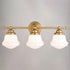 Vaxcel Huntley 3 Light Vanity in Natural Brass Model: W0453
